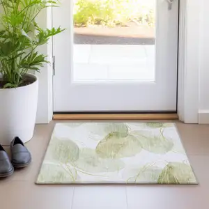 Photo of Green and Ivory Abstract Washable Non Skid Indoor Outdoor Area Rug