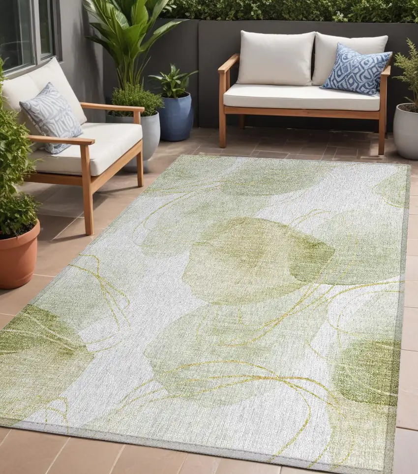 Green and Ivory Abstract Washable Non Skid Indoor Outdoor Area Rug Photo 1