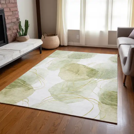 Green and Ivory Abstract Washable Non Skid Indoor Outdoor Area Rug Photo 9