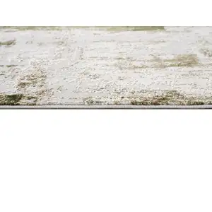 Photo of Green and Ivory Distressed Area Rug