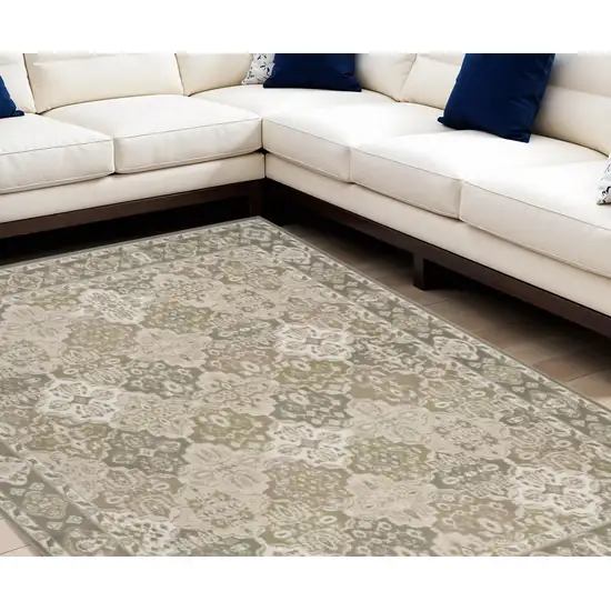 Green and Ivory Medallion Power Loom Distressed Area Rug Photo 1