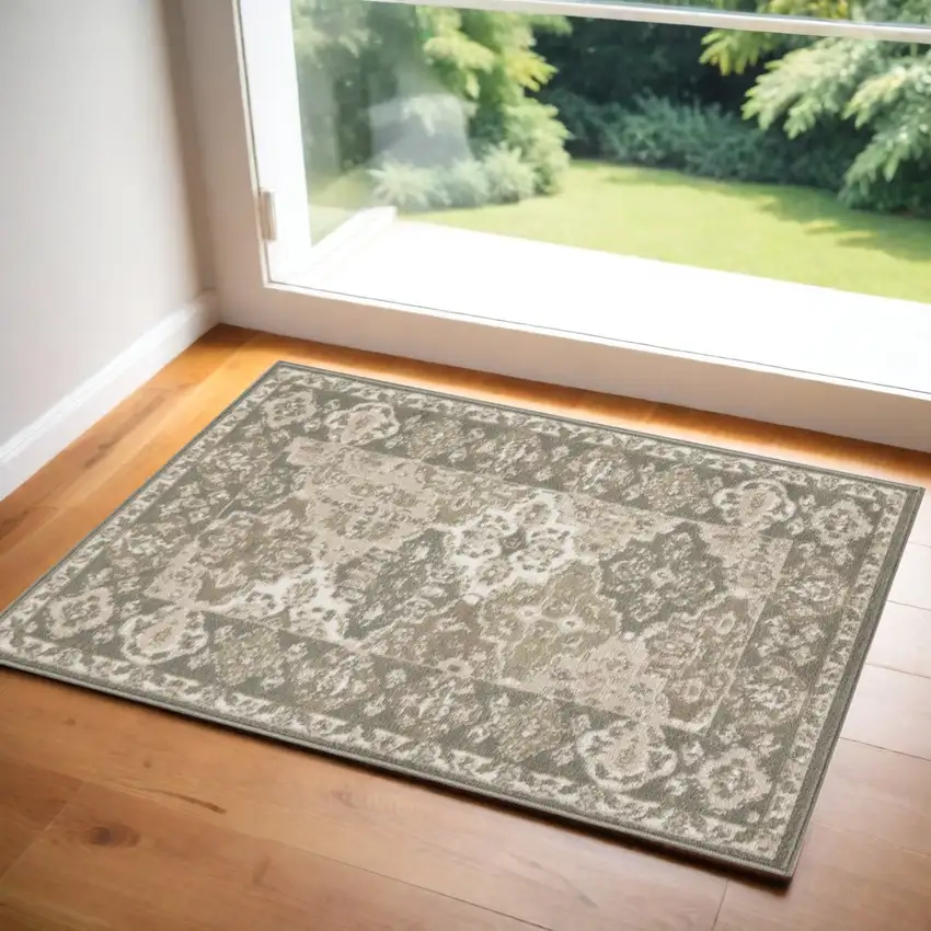Green and Ivory Ogee Power Loom Distressed Area Rug Photo 1