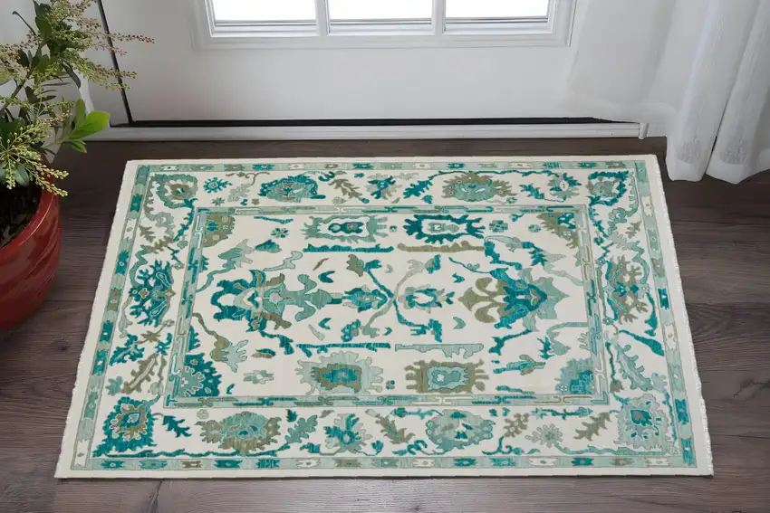 Green and Ivory Wool Floral Hand Knotted Area Rug With Fringe Photo 1