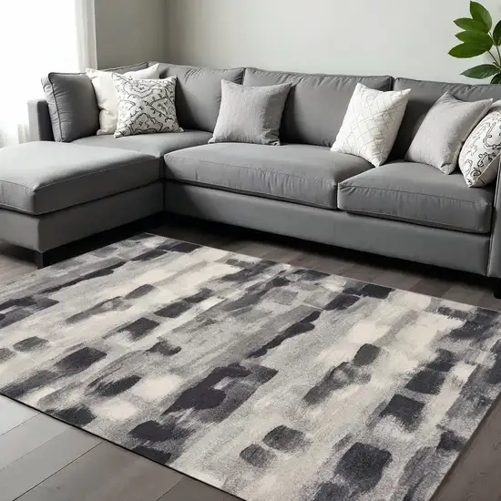 Gray Black And Ivory Abstract Area Rug Photo 1