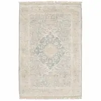 Photo of Grey And Beige Oriental Hand Loomed Stain Resistant Area Rug With Fringe