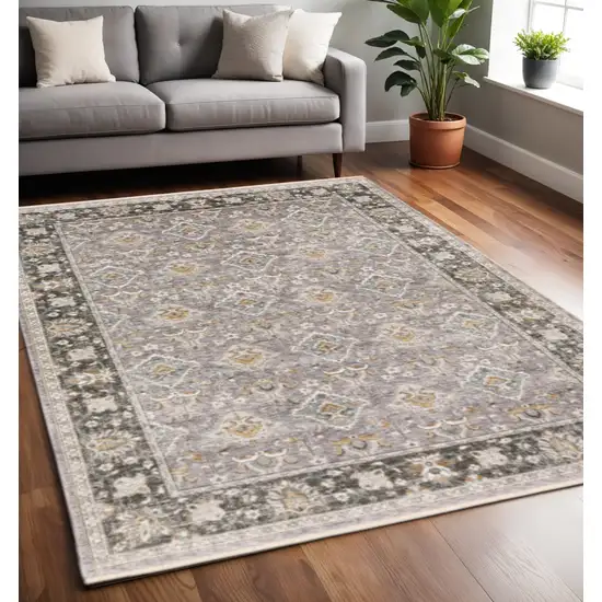 Grey And Blue Oriental Power Loom Stain Resistant Area Rug With Fringe Photo 1