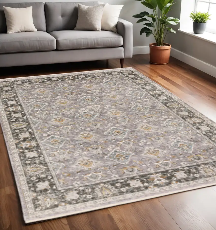 Grey And Blue Oriental Power Loom Stain Resistant Area Rug With Fringe Photo 1