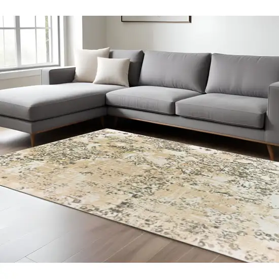 6' X 9' Grey And Gold Abstract Power Loom Stain Resistant Area Rug Photo 1