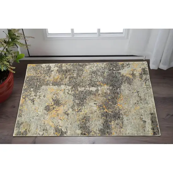 Gray and Ivory Abstract Power Loom Area Rug Photo 1