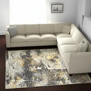 Photo of Grey And Gold Abstract Power Loom Stain Resistant Area Rug