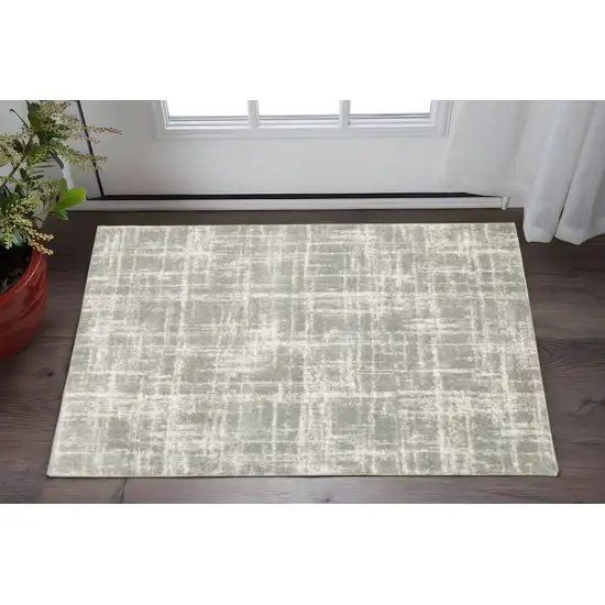 Grey And Ivory Abstract Shag Power Loom Stain Resistant Area Rug Photo 1