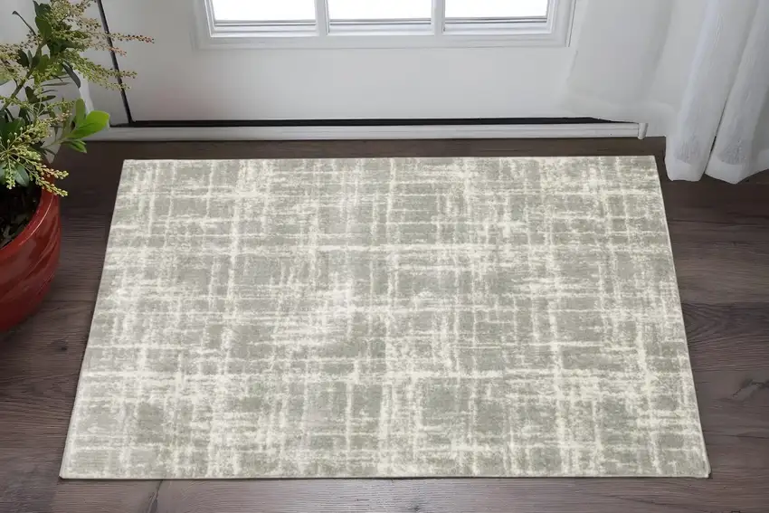 Grey And Ivory Abstract Shag Power Loom Stain Resistant Area Rug Photo 1