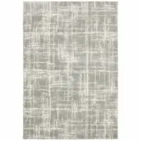 Photo of Grey And Ivory Abstract Shag Power Loom Stain Resistant Area Rug