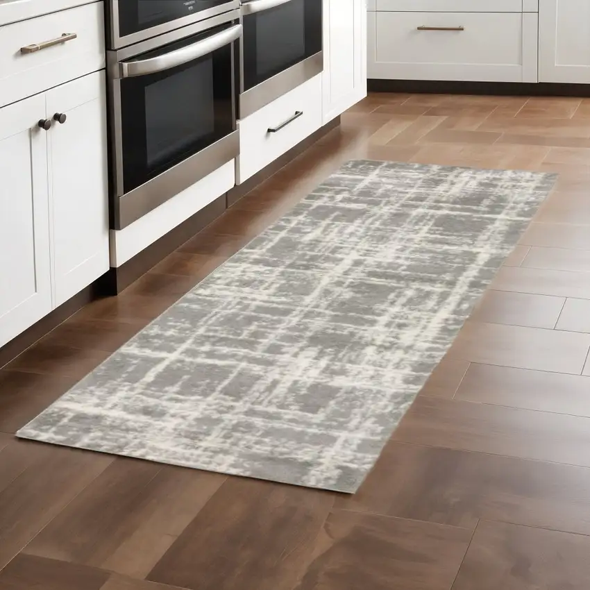 2' X 8' Grey And Ivory Abstract Shag Power Loom Stain Resistant Runner Rug Photo 1