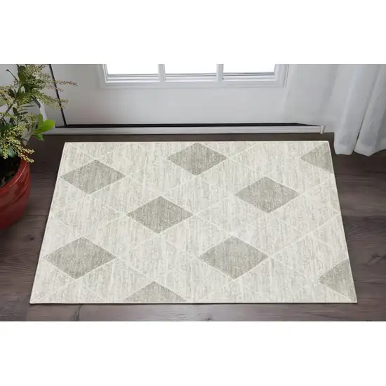 Grey And Ivory Geometric Power Loom Stain Resistant Area Rug Photo 1