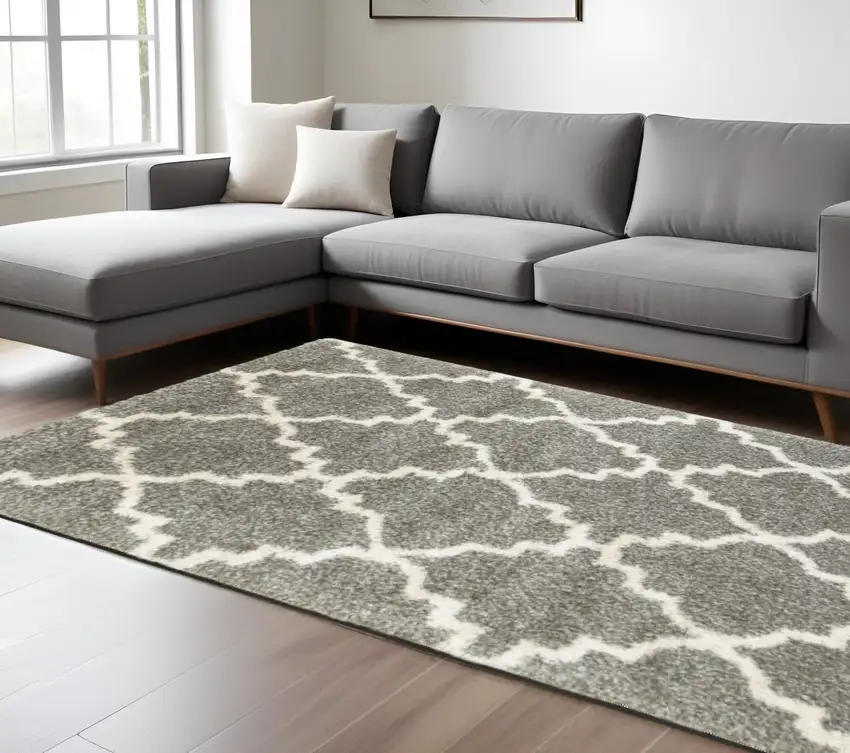 6' X 9' Grey And Ivory Geometric Shag Power Loom Stain Resistant Area Rug Photo 1