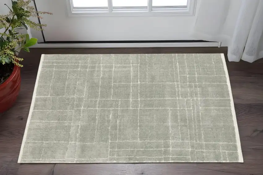Grey And Ivory Geometric Shag Power Loom Stain Resistant Area Rug Photo 1