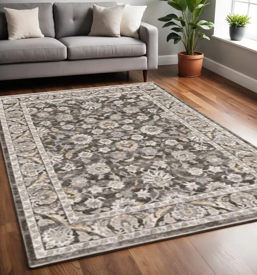Grey And Ivory Oriental Power Loom Stain Resistant Area Rug With Fringe Photo 1