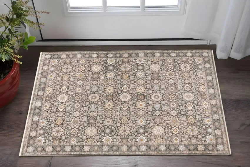 Grey And Ivory Oriental Power Loom Stain Resistant Area Rug With Fringe Photo 1