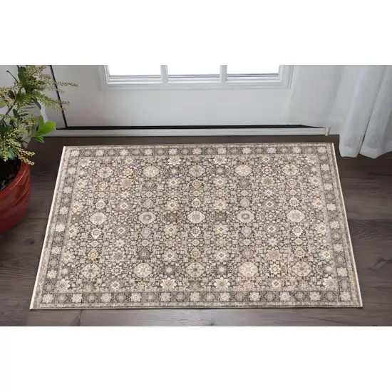 Grey And Ivory Oriental Power Loom Stain Resistant Area Rug With Fringe Photo 1