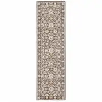 Photo of Grey And Ivory Oriental Power Loom Stain Resistant Runner Rug With Fringe