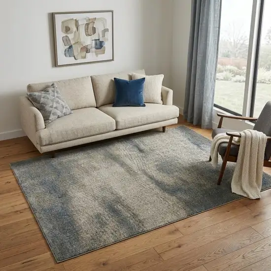 Beige And Blue Abstract Distressed Area Rug Photo 1