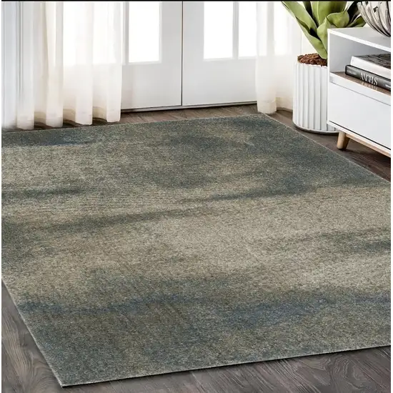 Beige And Blue Abstract Distressed Area Rug Photo 1