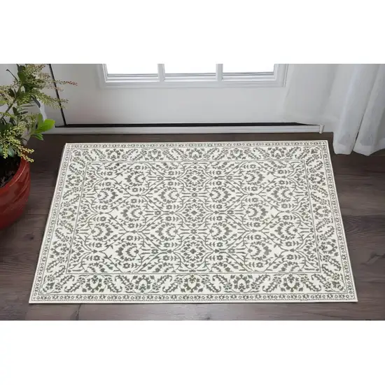Grey And White Floral Power Loom Stain Resistant Area Rug Photo 1