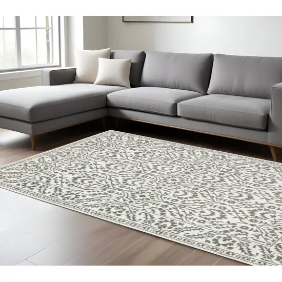 Gray And White Floral Distressed Area Rug Photo 1