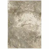 Photo of Grey Beige And Ivory Abstract Power Loom Stain Resistant Area Rug