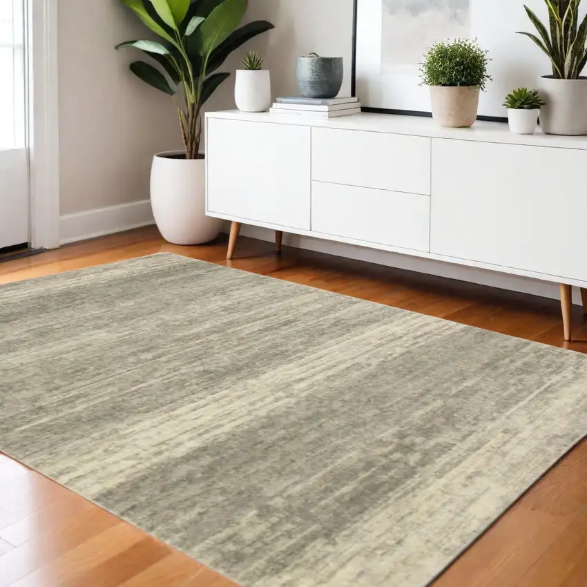 3' X 5' Grey Beige And Tan Abstract Power Loom Stain Resistant Area Rug Photo 1