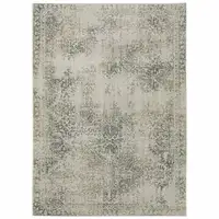 Photo of Grey Beige And Teal Oriental Power Loom Stain Resistant Area Rug