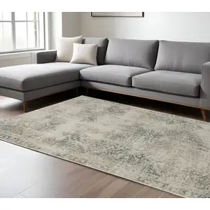 Photo of Grey Beige And Teal Oriental Power Loom Stain Resistant Area Rug