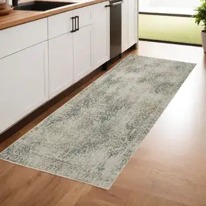 Photo of Grey Beige And Teal Oriental Power Loom Stain Resistant Runner Rug