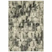 Photo of Grey Beige Charcoal And Blue Abstract Power Loom Stain Resistant Area Rug