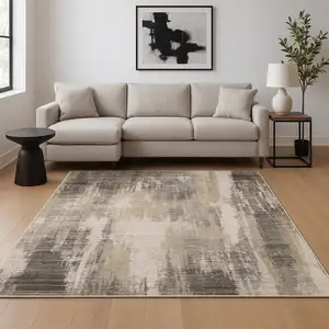 Photo of Grey Beige Charcoal Brown Tan And Ivory Abstract Power Loom Stain Resistant Area Rug