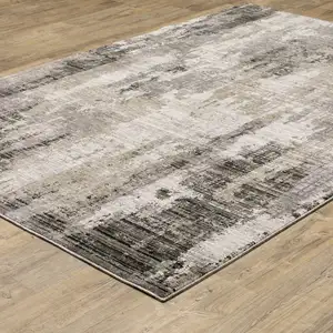 Photo of Grey Beige Charcoal Brown Tan And Ivory Abstract Power Loom Stain Resistant Area Rug