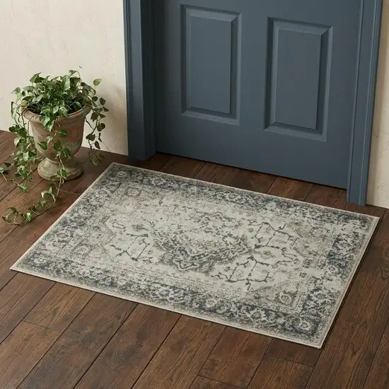 Beige And Blue Oriental Distressed Area Rug Photo 1