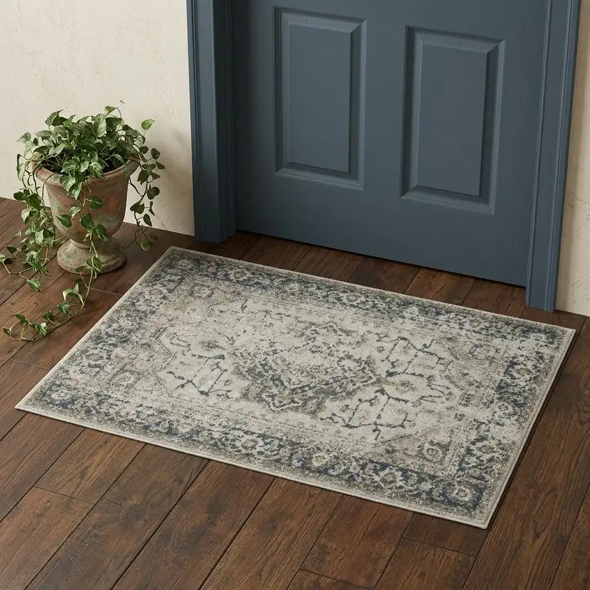 Beige And Blue Oriental Distressed Area Rug Photo 1