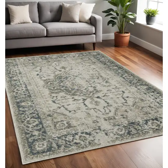 Beige And Blue Oriental Distressed Area Rug Photo 1