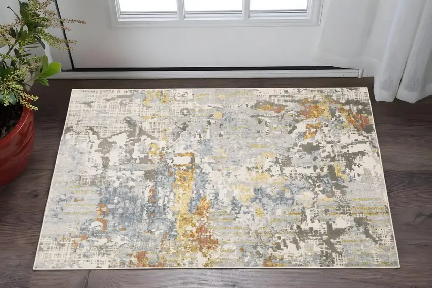 Beige And Blue Abstract Area Rug Photo 1