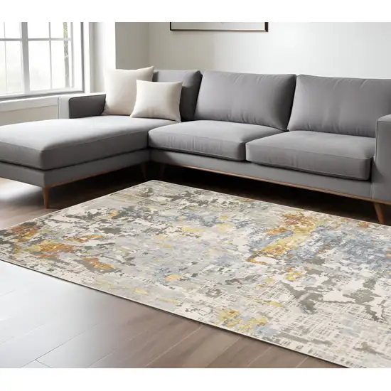 Beige And Blue Abstract Area Rug Photo 1
