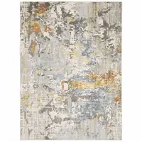 Photo of Grey Blue Beige Gold And Rust Abstract Power Loom Stain Resistant Area Rug