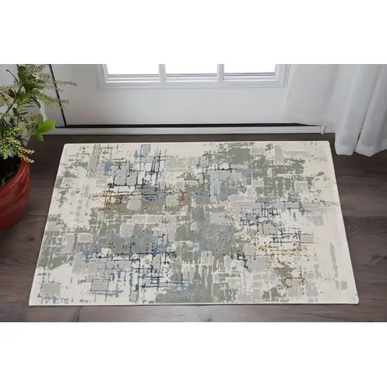 Grey Blue Brown Ivory And Deep Blue Abstract Power Loom Stain Resistant Area Rug Photo 1