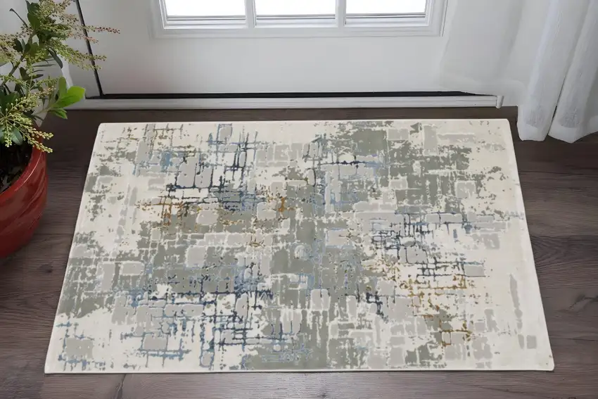 Grey Blue Brown Ivory And Deep Blue Abstract Power Loom Stain Resistant Area Rug Photo 1