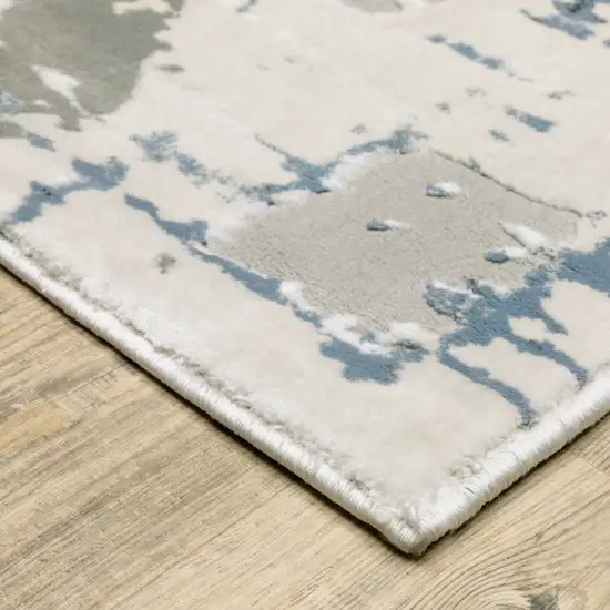 6' X 9' Grey Blue Brown Ivory And Deep Blue Abstract Power Loom Stain Resistant Area Rug Photo 4
