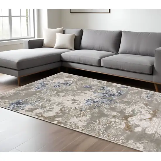 6' X 9' Grey Blue Ivory Brown And Navy Abstract Power Loom Stain Resistant Area Rug Photo 1