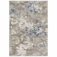 Photo of Grey Blue Ivory Brown And Navy Abstract Power Loom Stain Resistant Runner Rug