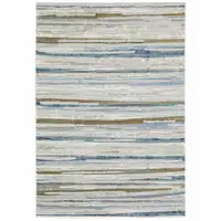 Photo of Grey Blue Ivory Brown Beige And Navy Abstract Power Loom Stain Resistant Area Rug