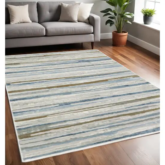 Grey Blue Ivory Brown Beige And Navy Abstract Power Loom Stain Resistant Area Rug Photo 1